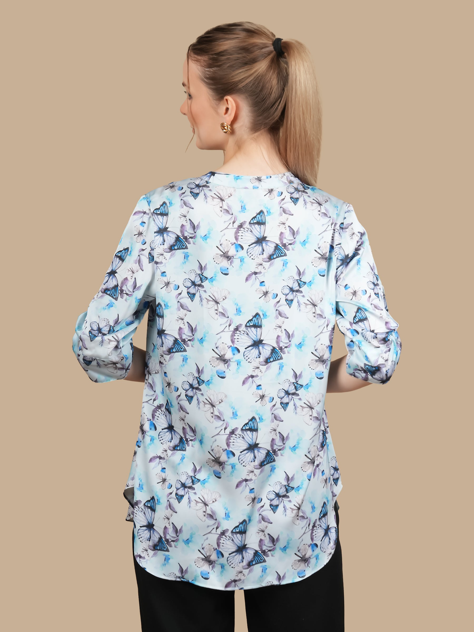 BUTTERFLY GARDEN FRONT TUCK AQUA TOP